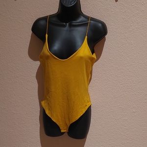 Yellow bodysuit